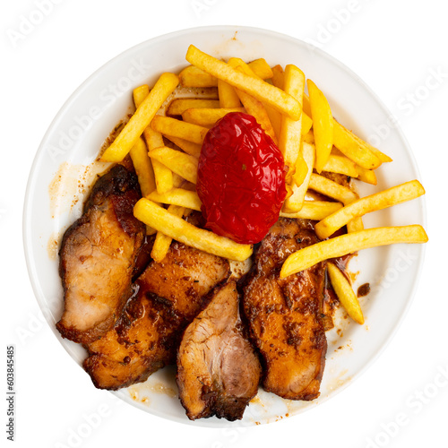 Service plate containing Fried piece of pork with French fries and green peppers. Isolated over white background
