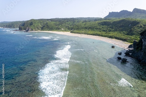 沖縄県国頭郡国頭村辺戸の辺戸岬、宇佐浜の海をドローンで空撮した風景 Aerial drone view of the sea at Cape Hendo and Usahama beach in Hendo, Kunigami-mura, Kunigami-gun, Okinawa, Japan  photo