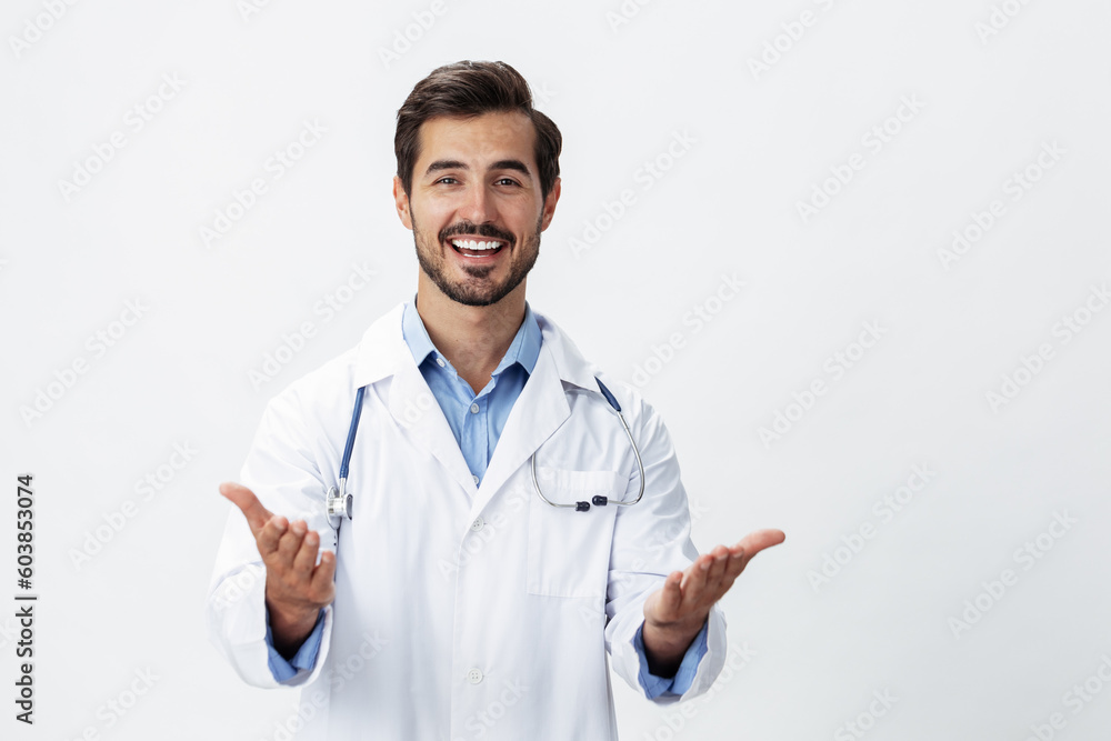 man doctor in a white coat with a stethoscope and wearing glasses for a smile hands up victory and happiness on a white isolated background looking into the camera, copy space, space for text, health