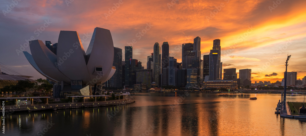 Landscape view of Singapore business district and city at twilight. Singapore cityscape at dusk building around Marina bay. - obrazy, fototapety, plakaty 