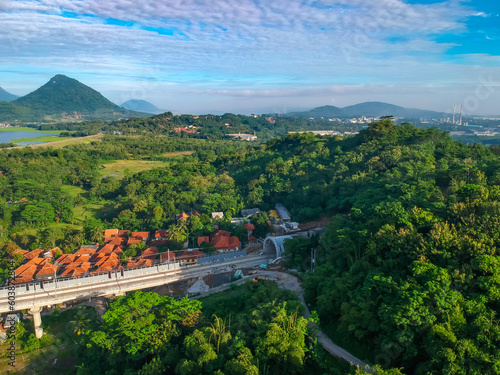 Aerial View of the Construction of the Balance Cantilever Long Span Bridge for the Jakarta-Bandung Fast Train Project of Jatiluhur Purwakarta West Java Indonesia photo