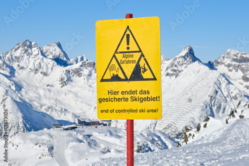 End of a ski area warning sign on ski slope, in German, at Ischgl ski resort, on the border of Austria and Switzerland.