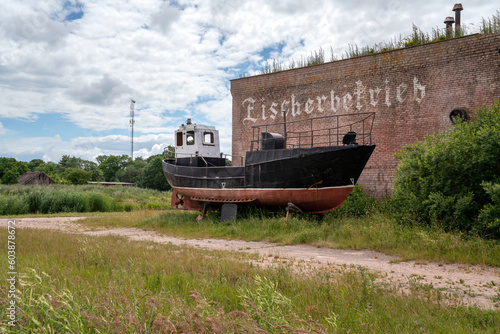 View of an old ship in the village of Rybachy on a sunny summer day  Curonian Spit  Kaliningrad region  Russia