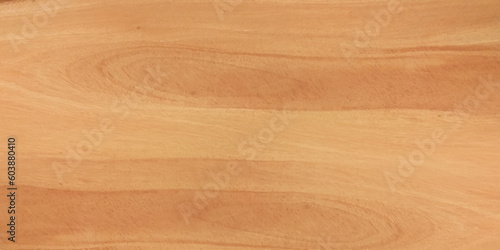 Horizontal grain medium brown pecan wood color chip can be used as background or wood grain sample.