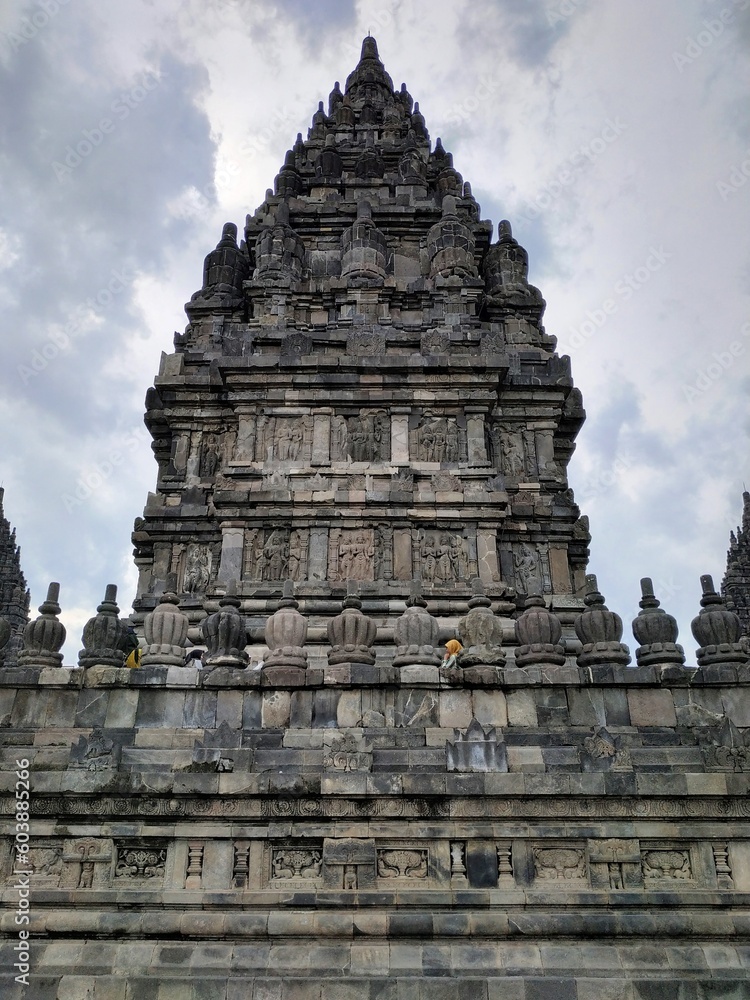 Naklejka premium Yogyakarta, Indonesia – January 27, 2019: Shrine Of Prambanan Hindu Temple Compound Included In World Heritage List. Monumental Ancient Architecture, Carved Stone Walls. Selected Focus