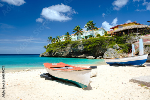 Wooden fishing boat at Playa Lagun Beach Curacao, Lagun Beach Curacao a small island in the Caribbean. white tropical beach on the Caribbean island of Curacao 