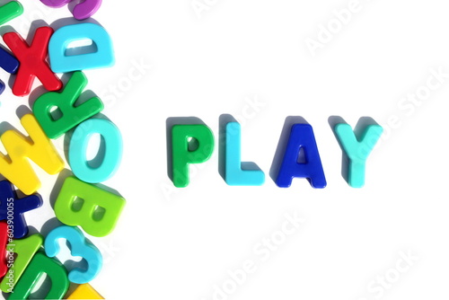 The word "Play" is written in bright letters on a white background.