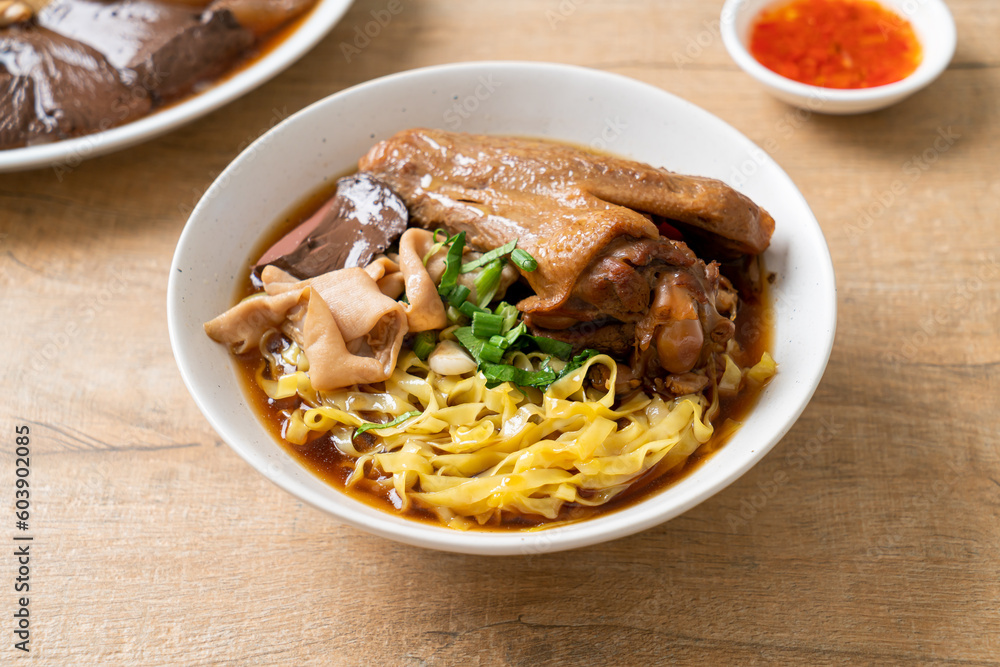 egg noodles with stewed and braised duck in brown soup egg noodles with stewed and braised duck in brown soup