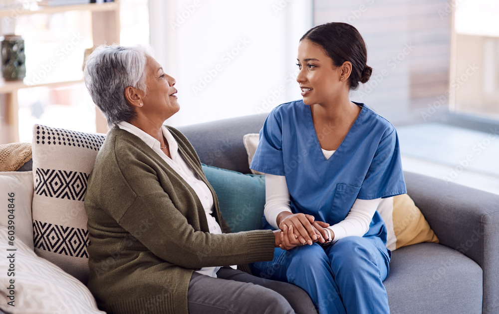 Support, caregiver holding hands with a senior woman and on sofa at nursing home for care. Consulting or healthcare conversation, communication with nurse and elderly female patient talking on couch Support, caregiver holding hands with a senior woman and on sofa at nursing home for care. Consulting or healthcare conversation, communication with nurse and elderly female patient talking on couch