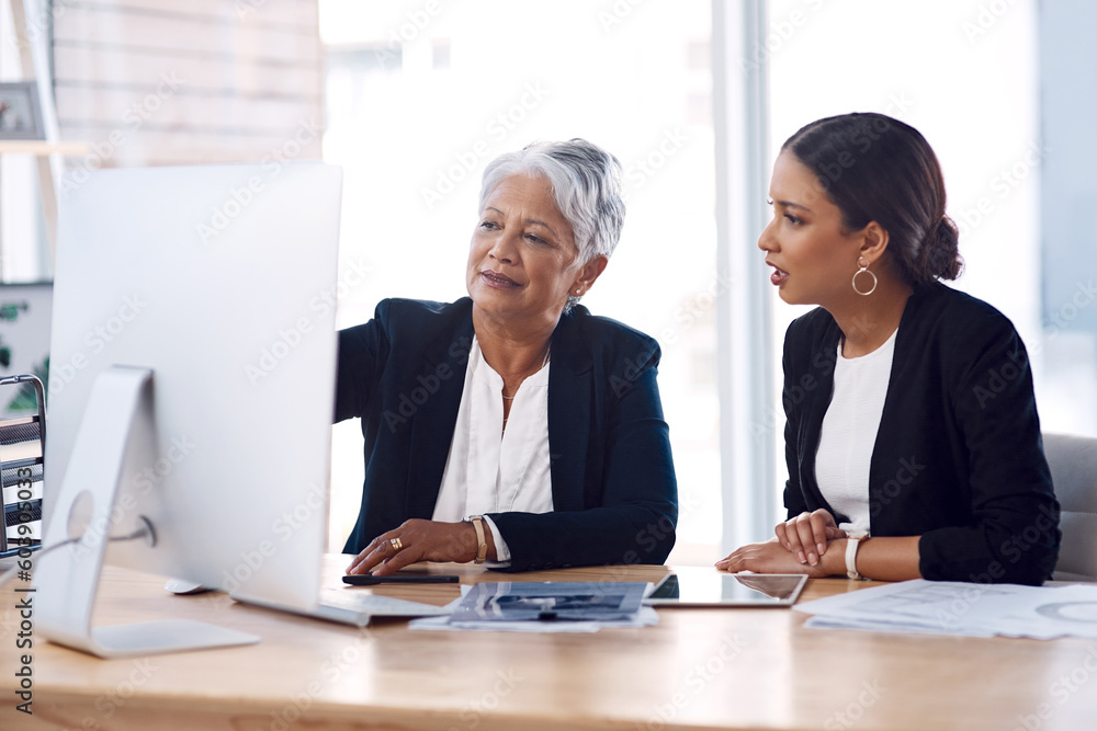 Mentor, coaching or business women with computer talking, speaking or planning a project in office. Technology, teamwork collaboration or senior manager explaining to an intern for digital training Mentor, coaching or business women with computer talking, speaking or planning a project in office. Technology, teamwork collaboration or senior manager explaining to an intern for digital training