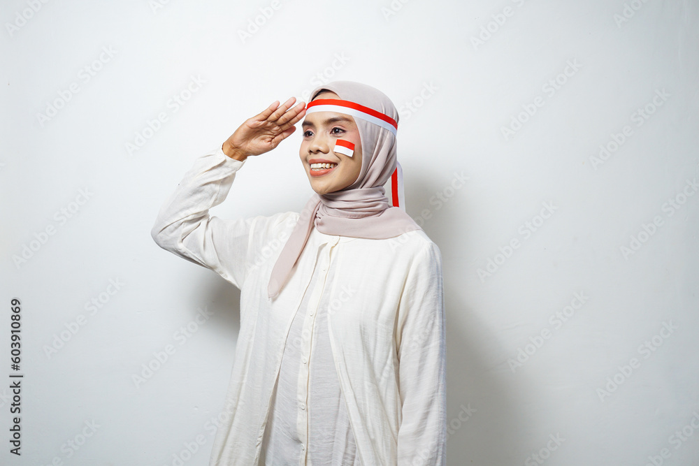 Portrait of Young Asian Muslim Women celebrate Indonesian independence day isolated on white background Portrait of Young Asian Muslim Women celebrate Indonesian independence day isolated on white background