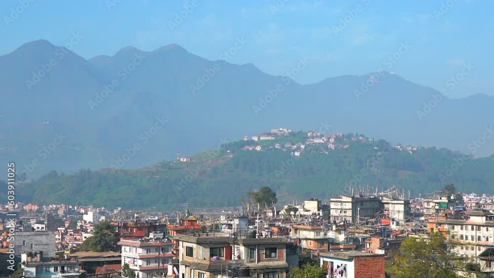 Clear skies bluebird showing himalayas mountain range landscape downtown Kathmandu Nepal rooftop still recovered after earthquakes bright vibrant beautiful architecture slow pan no smog Clear skies bluebird showing himalayas mountain range landscape downtown Kathmandu Nepal rooftop still recovered after earthquakes bright vibrant beautiful architecture slow pan no smog