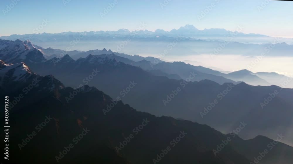 Sea of mountains Cinematic scenic flight Mt Everest Lhotse Himalayas Nepal Kathmandu Buddha Air dramatic lighting sunrise on tallest mountain peaks in the world National Geographic seven wonders pan Sea of mountains Cinematic scenic flight Mt Everest Lhotse Himalayas Nepal Kathmandu Buddha Air dramatic lighting sunrise on tallest mountain peaks in the world National Geographic seven wonders pan