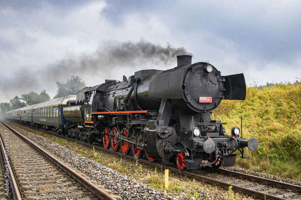 a ride on a historic steam tourist train pulled by a German locomotive
