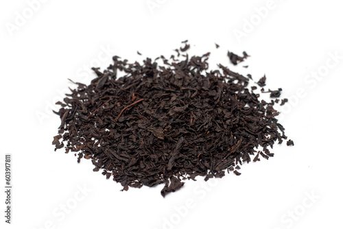 dry white tea leaves of black tea on a white background