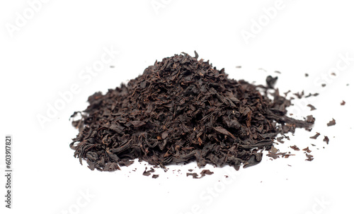 dry white tea leaves of black tea on a white background