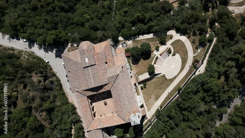 Basilica of Sant'Ubaldo on Ingino Mount, Gubbio in Umbria, Italy. Aerial top-down descending directly above photo