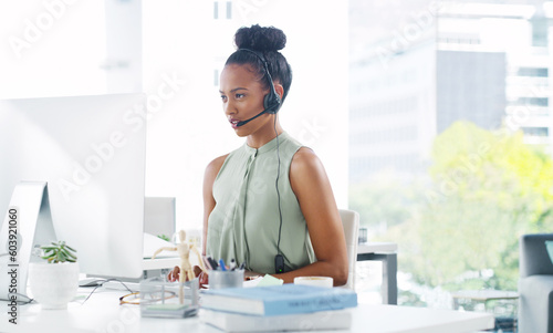 Woman, callcenter and contact us, phone call with CRM and headset, consultant working at computer. Customer service, telemarketing and female agent on help desk, tech support and communication