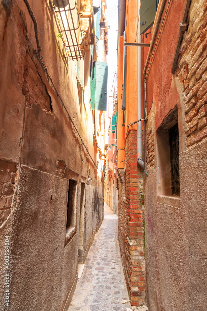 Venice, Italy. Narrow street in the historical part of Venice. Street Calle del Forno