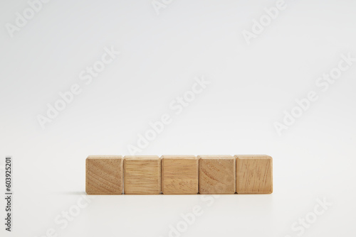 Fototapeta Naklejka Na Ścianę i Meble -  Wooden cube blocks with empty copy space for message word