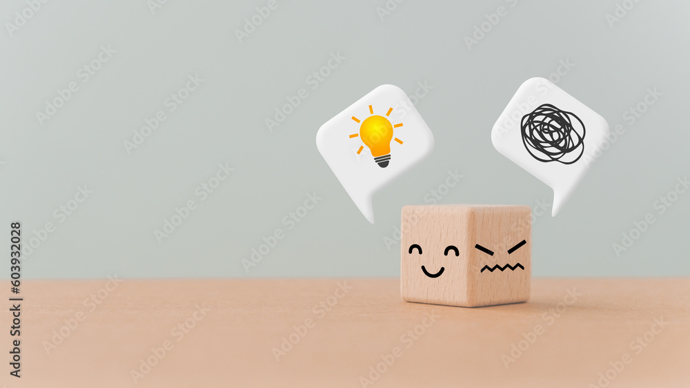 turned wooden cube block unhappy face  to happy with a tangle of thoughts and brighten lightbulb on white speech bubble, for creative, solution, problem solving concept - obrazy, fototapety, plakaty 