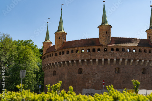 Kraków Barbican on Basztowa Street in Krakow, Poland. Barbakan Krakowski monument. Historic fortified gateway of the Old Town of Cracow. photo