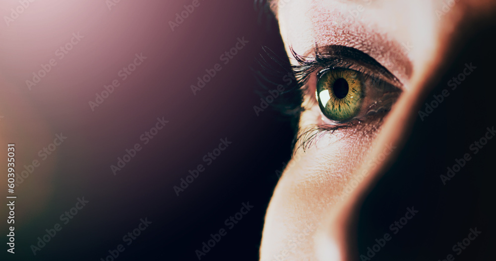 Woman, face and closeup of eye on mockup space for vision or sight against a dark background. Female person with eyelashes and green or hazel eyes looking in perception, eyesight or light on mock up - obrazy, fototapety, plakaty 