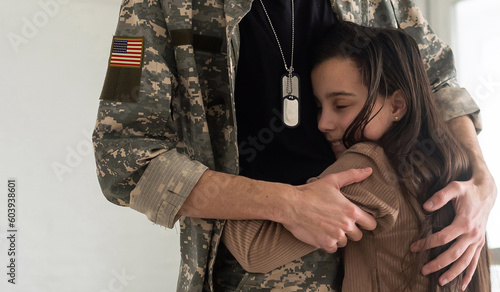 Soldier reunited with his daughter.