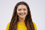 Happy, smile and portrait of a woman with braces isolated on a white background in a studio. Happiness, confident and a face headshot of a young girl with dreadlocks, confidence and positivity
