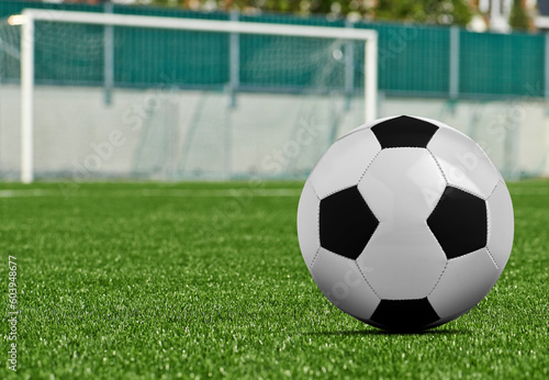 Black and white Soccer ball on grass field