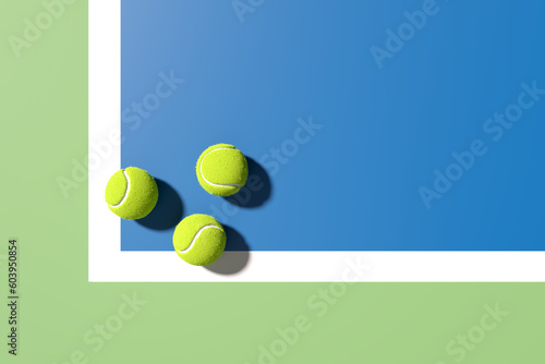 Three tennis balls at the corner of the lines on blue tennis court. 3D rendering. Flat lay overhead view. © Cagkan
