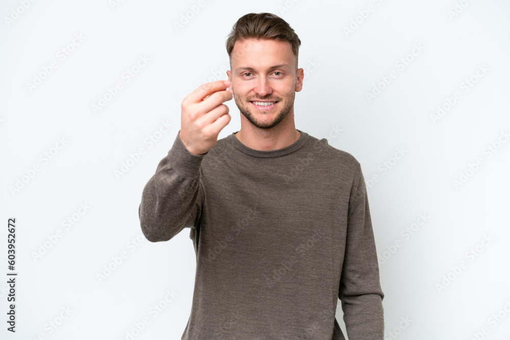 Fototapeta premium Young blonde caucasian man isolated on white background making money gesture