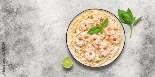 Photography Spaghetti pasta with shrimps scampi on a light background
