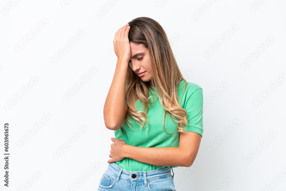Young Uruguayan woman isolated on white background with headache Young Uruguayan woman isolated on white background with headache