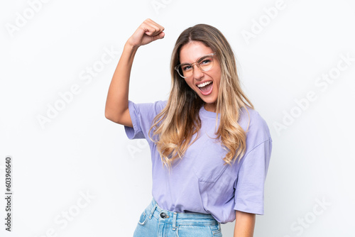 Young Uruguayan woman isolated on white background celebrating a victory