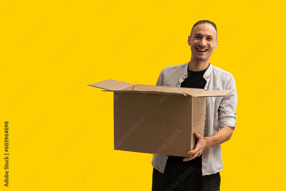 young man carries the box young man carries the box