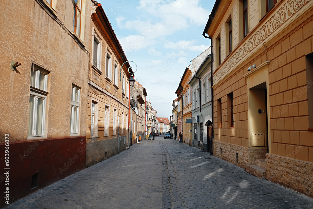 Postavaru Street, medieval pedestrian street in the Old city of Brasov, Transylvania, Romania