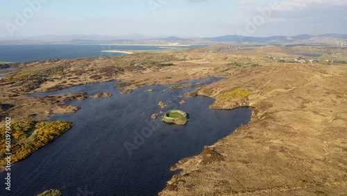 Aerial view of Lough Doon between Portnoo and Ardara which is famous for the medieval fort - County Donegal - Ireland. photo