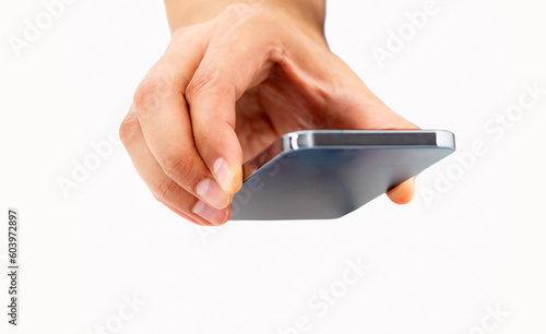 Closeup of hand holding up a smart phone with a white background