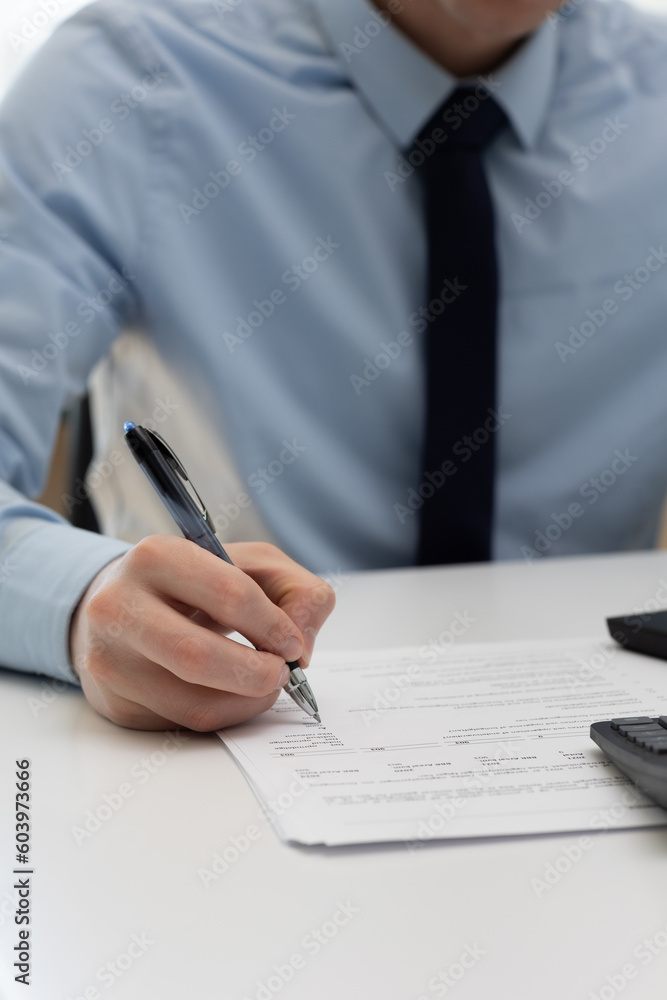 Bussinessman taking notes. Bussinessman taking notes.