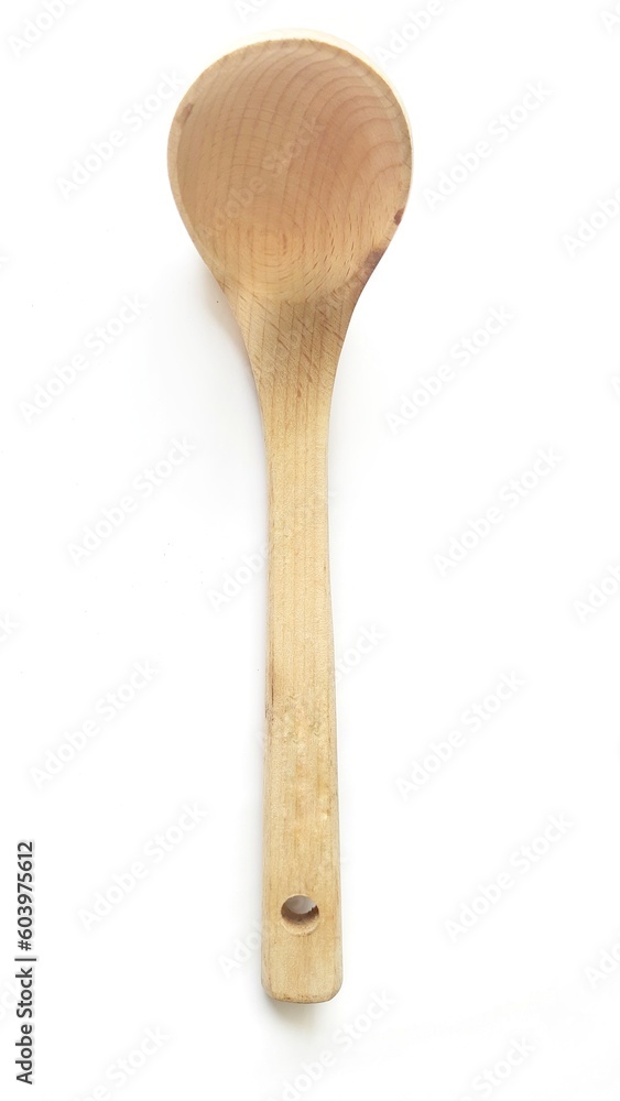 Wooden spatula and cooking spoons. Utensils for the kitchen prepare to cooking food isolated on white background Wooden spatula and cooking spoons. Utensils for the kitchen prepare to cooking food isolated on white background