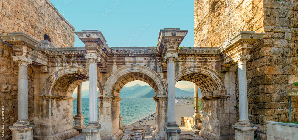 Obraz premium Welcome to the magnificent Antalya concept. Collage of famous landmarks: Hadrian's Gate old town Kaleici district and Konyaaltı beach popular holiday destination in Antalya, Turkey