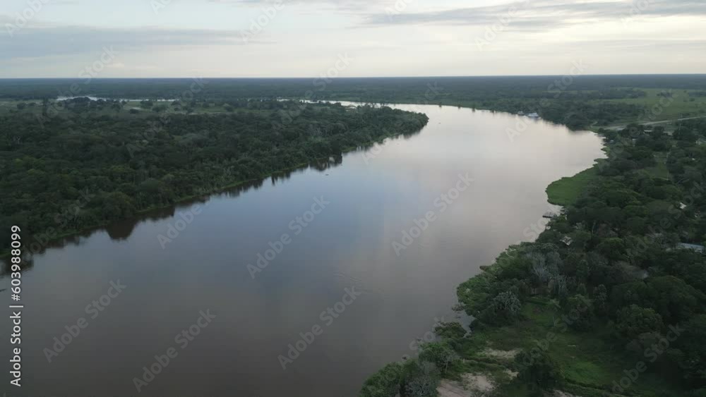aerial view of big stream rivered passing in to the wilderness jungle of Pantanal wetland Brazil aerial view of big stream rivered passing in to the wilderness jungle of Pantanal wetland Brazil