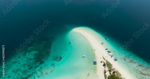Top view of beautiful Sibuan island with a beach and a coral atoll. Tun Sakaran Marine Park. Borneo, Sabah, Malaysia. photo