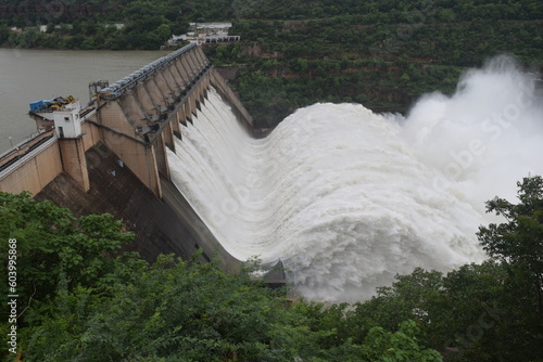 The Srisailam Dam is constructed Krishna River on the border of Mahabubnagar District, Telangana & Kurnool District, Andhra Pradesh near Srisailam temple town & is the 2nd largest capacity working  photo