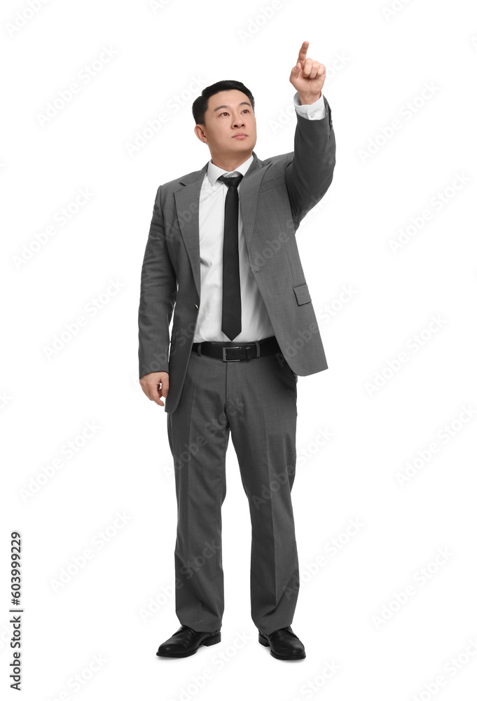 Businessman in suit posing on white background Businessman in suit posing on white background