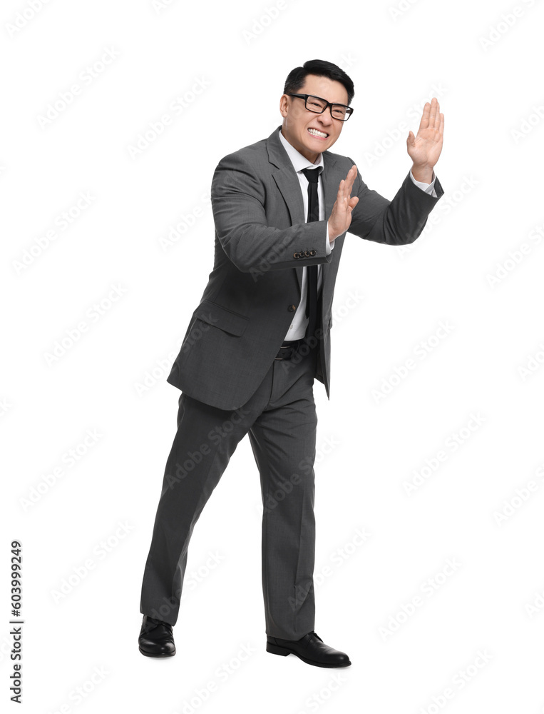 Businessman in suit posing on white background Businessman in suit posing on white background