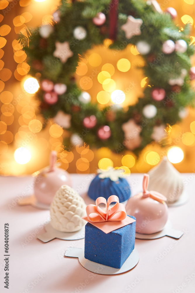 Merry Christmas card. Variety of sweet delicious cakes. Fir branches on a gray background. Merry Christmas card. New year mood Merry Christmas card. Variety of sweet delicious cakes. Fir branches on a gray background. Merry Christmas card. New year mood