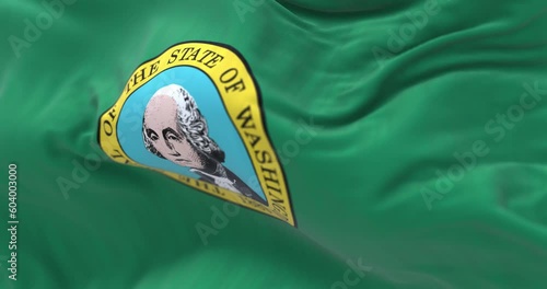 Seamless loop in slow motion of Washington state flag waving photo