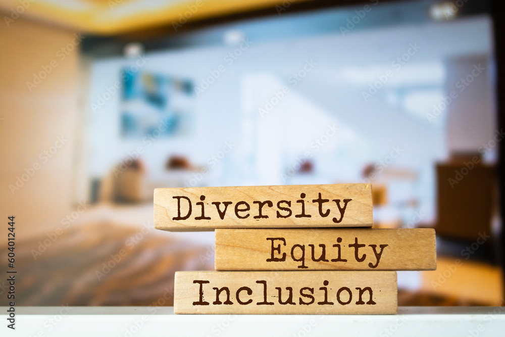 Wooden blocks with words 'Diversity Equity Inclusion'. Wooden blocks with words 'Diversity Equity Inclusion'.